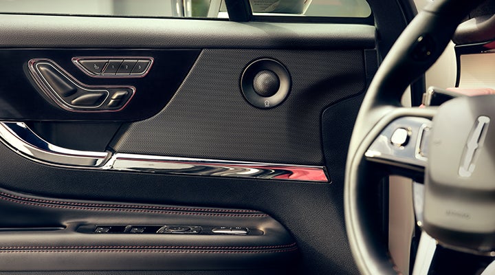 A Revel® audio speaker is shown in the driver’s side door of a 2024 Lincoln Corsair® SUV. | Duncan Lincoln in Blacksburg VA