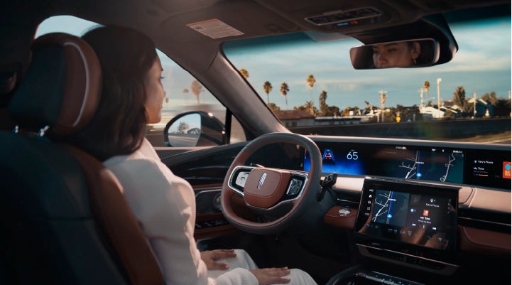 A person is shown driving hands-free on the highway with available Lincoln BlueCruise technology. | Duncan Lincoln in Blacksburg VA