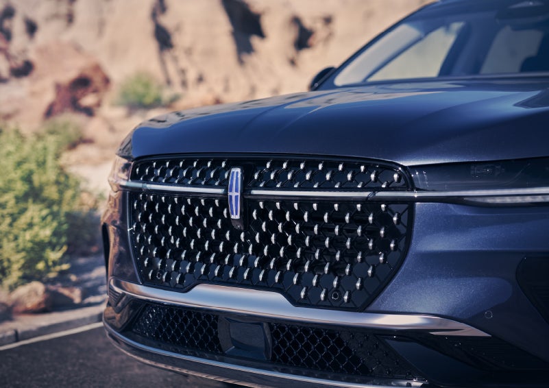 The stylish grille of a 2024 Lincoln Nautilus® SUV sparkles in the sunlight. | Duncan Lincoln in Blacksburg VA